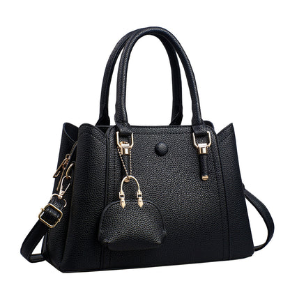 Elegant beige women’s handbag with a spacious interior